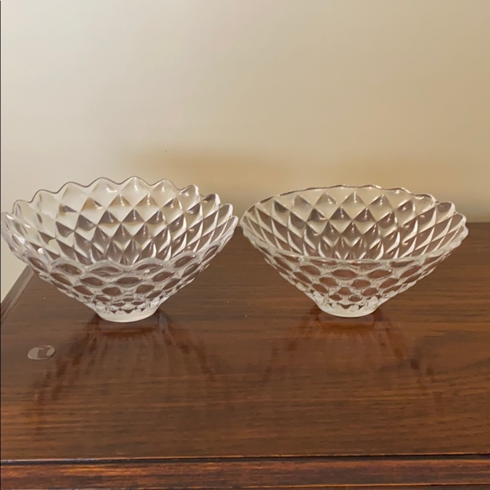 two transparent glass bowls